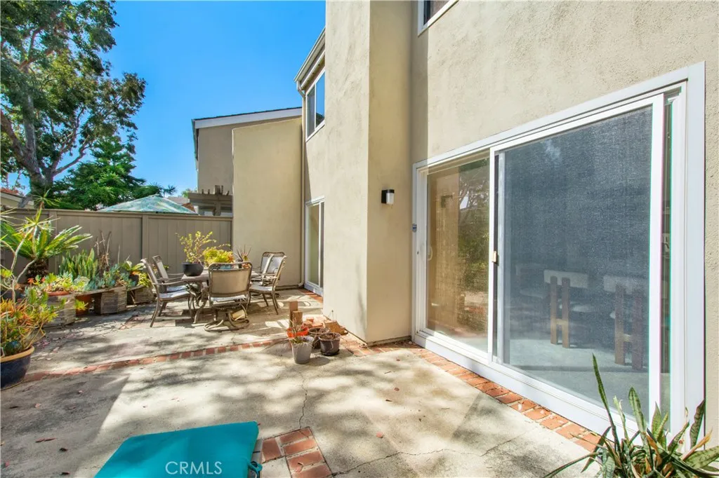 Private paved and brick back patio.