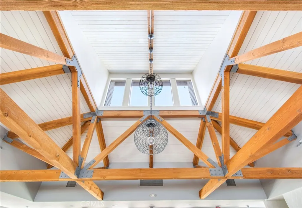 The newly remodeled clubhouse (2) including beautiful, vaulted ceiling, natural light flooding in from above.