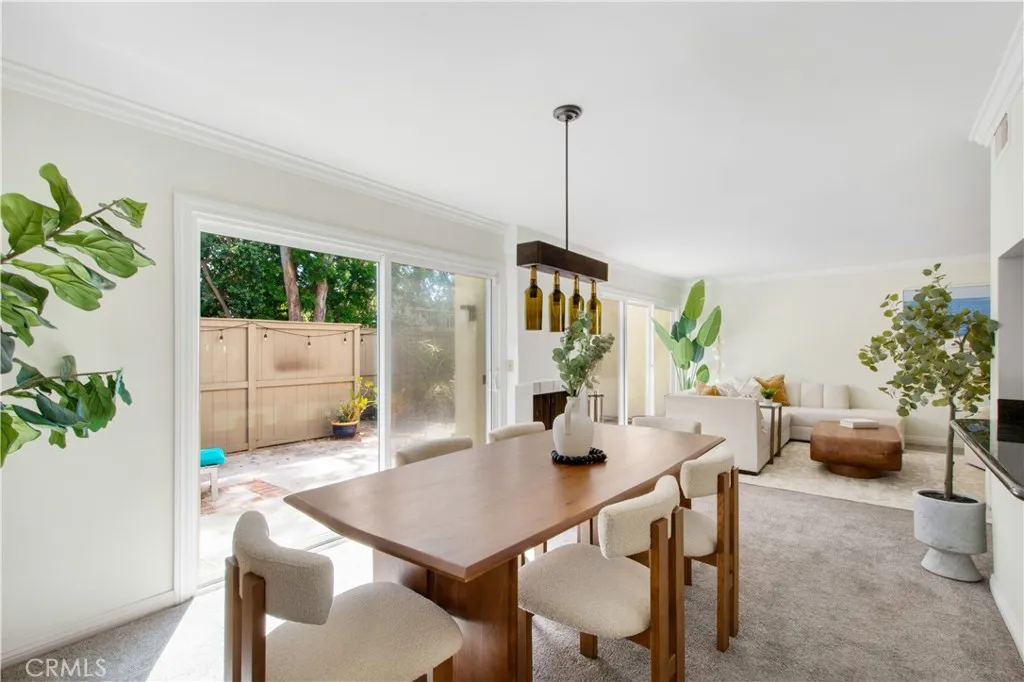 Dining room, dual pane slider leading to back patio and family room.