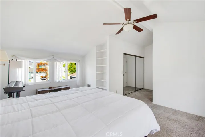 2nd primary, vaulted ceiling, dual pane windows to front of home over garage and mirror sliding closet doors