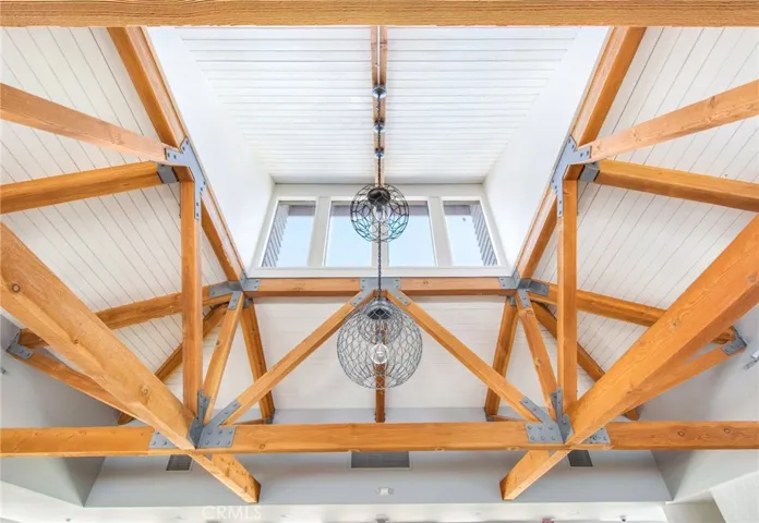 The newly remodeled clubhouse (2) including beautiful, vaulted ceiling, natural light flooding in from above.