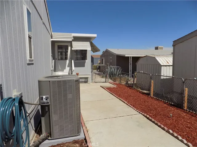 New AC Condenser in fenced yard