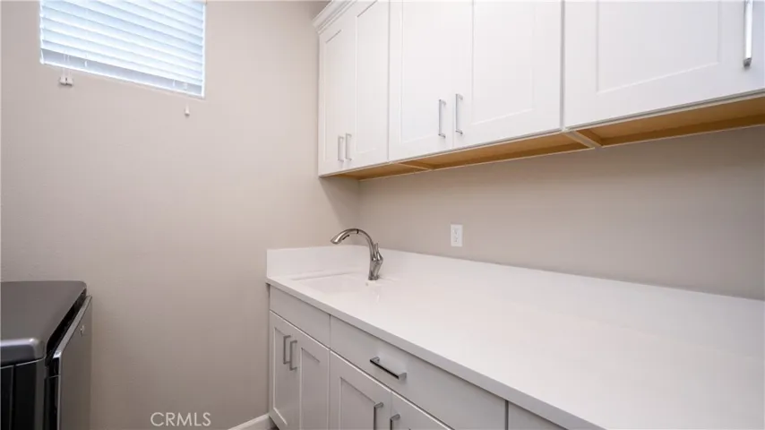 Upstairs Interior Laundry Room w/Utility Sink