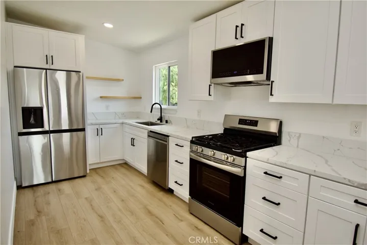 Remodeled kitchen with all stainless steal appliancs