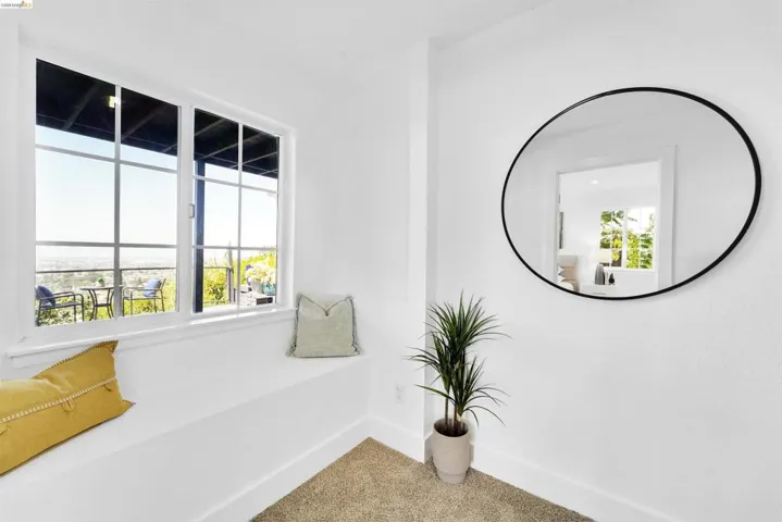 Bright window with grid-pane design and a built-in window bench