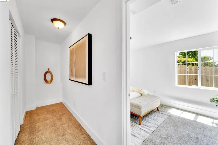 White walls and trim throughout, with a recessed ceiling light fixture