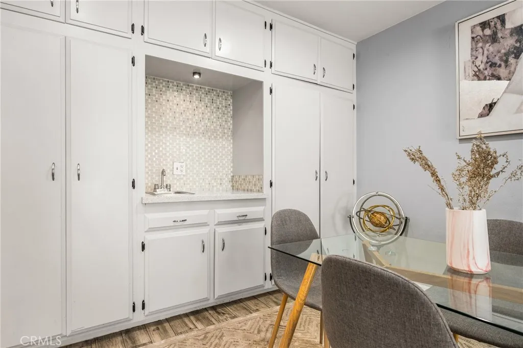 enjoy a cocktail at the chic wetbar, with built-in storage