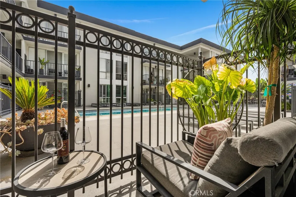 enjoy a poolside view from your private patio