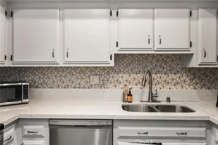 upgraded with sleek quartz countertops