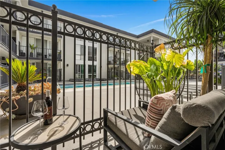 enjoy a poolside view from your private patio