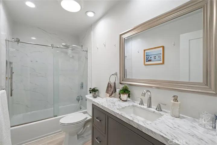Remodeled bathroom with tub & shower
