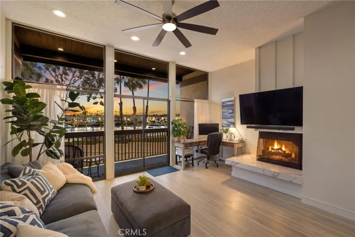 Fireplace and skyline digitally enhanced. Fireplace is operable during limited months per HOA