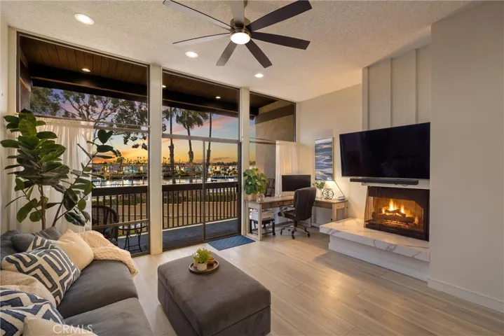 Fireplace and skyline digitally enhanced. Fireplace is operable during limited months per HOA