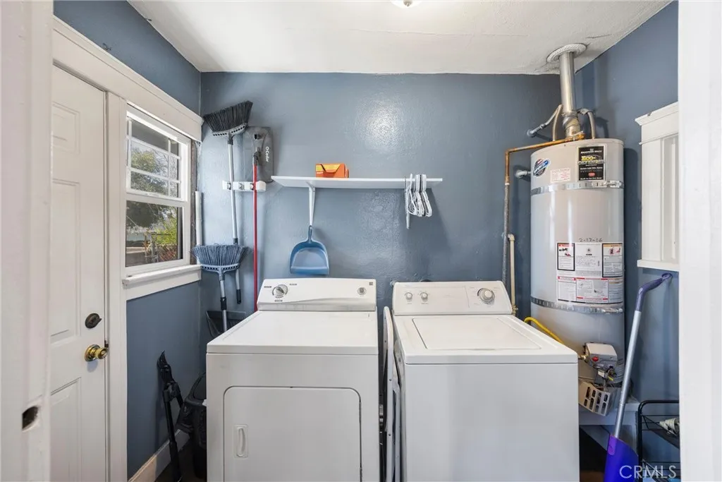 indoor laundry room with exit to driveway.