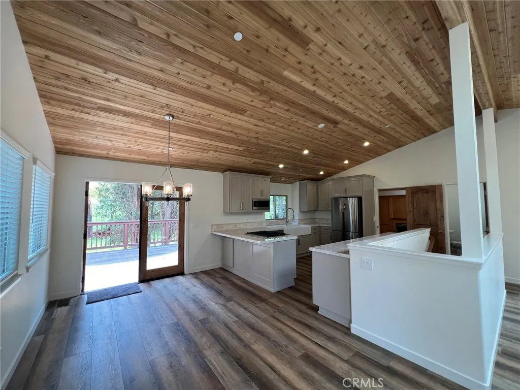 Dining area, expansive kitchen, completely newly remodeled.
