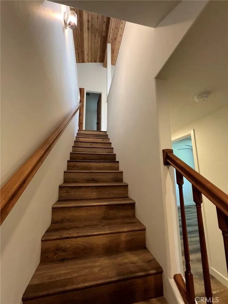 Downstairs to bedrooms and full bathrooms