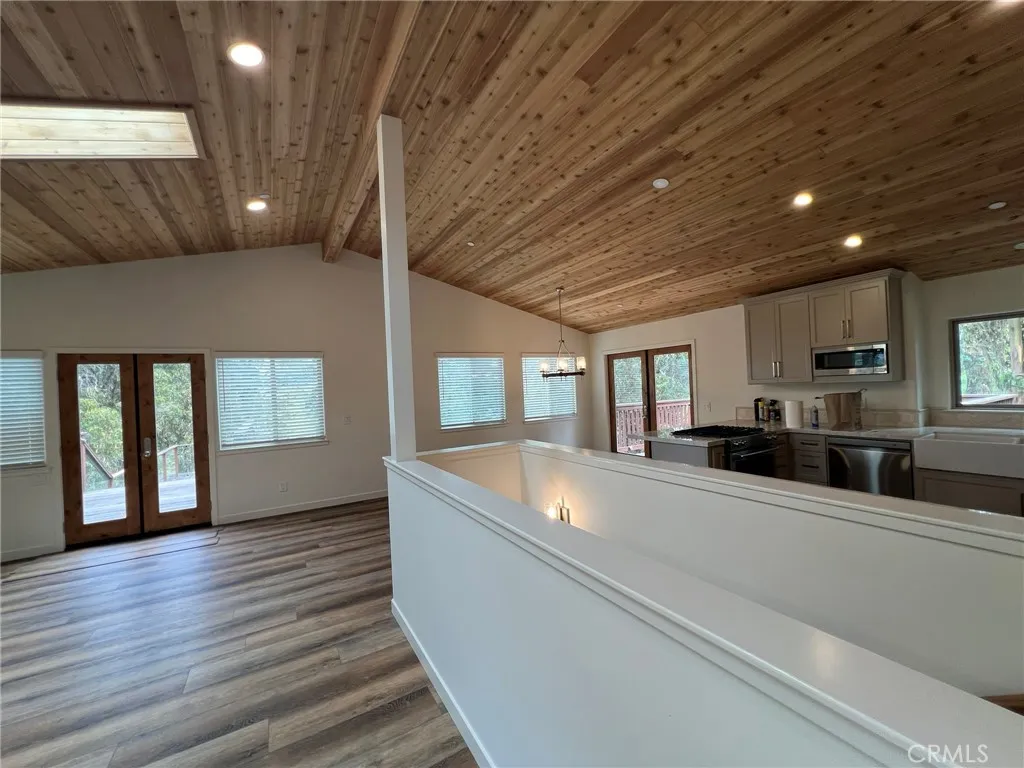 Staircase down to bedrooms, bathroom and laundry room