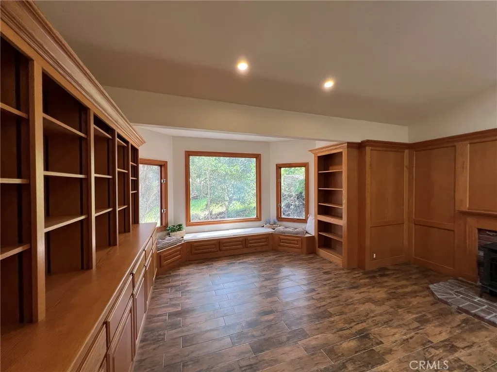 Lots of built ins for a library, studio, media room.