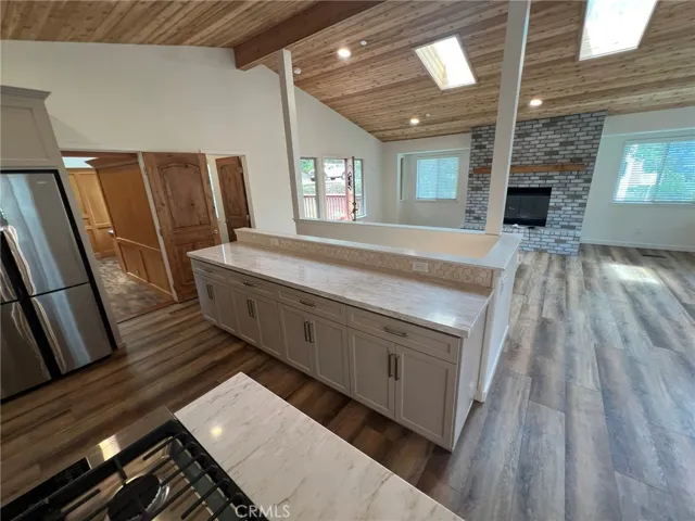 Granite counter tops and soft close cabinetry. Lots of storage
