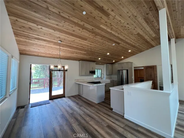 Dining area, expansive kitchen, completely newly remodeled.
