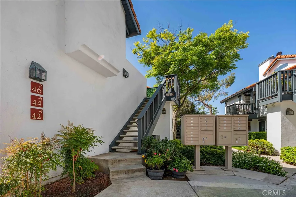 Stairway to Upstairs Patio and Front Entry