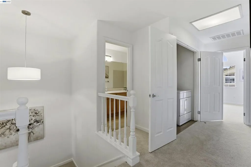Hall with access to laundry and hall bath