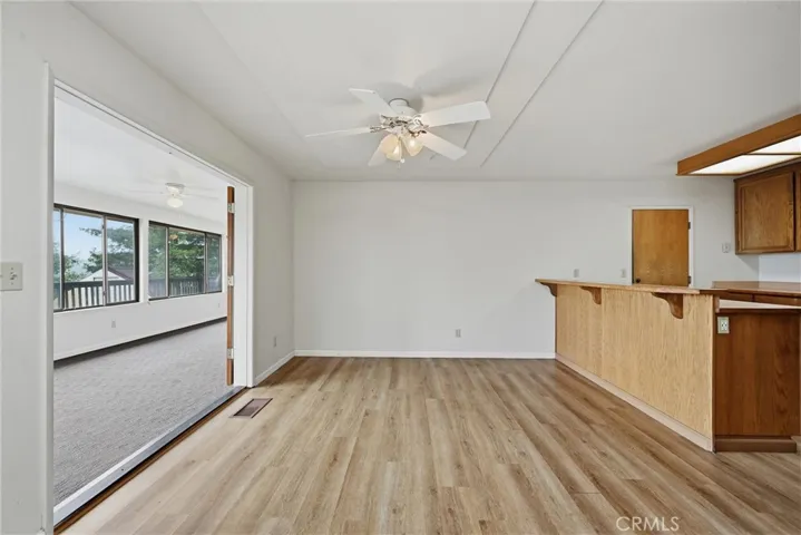 Dining area has laminate floors.