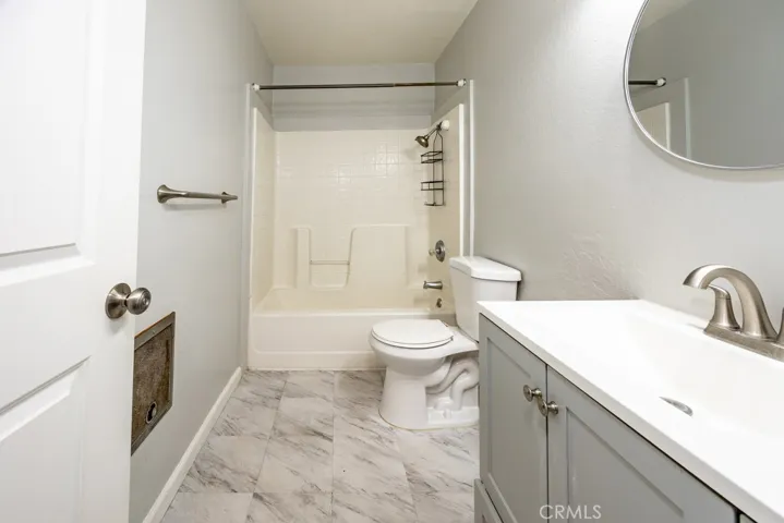 Remodeled bathrooms in all 4 units.