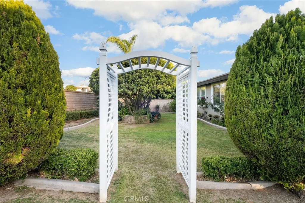 Additional Yard with a Shade Tree and Stunning Roses