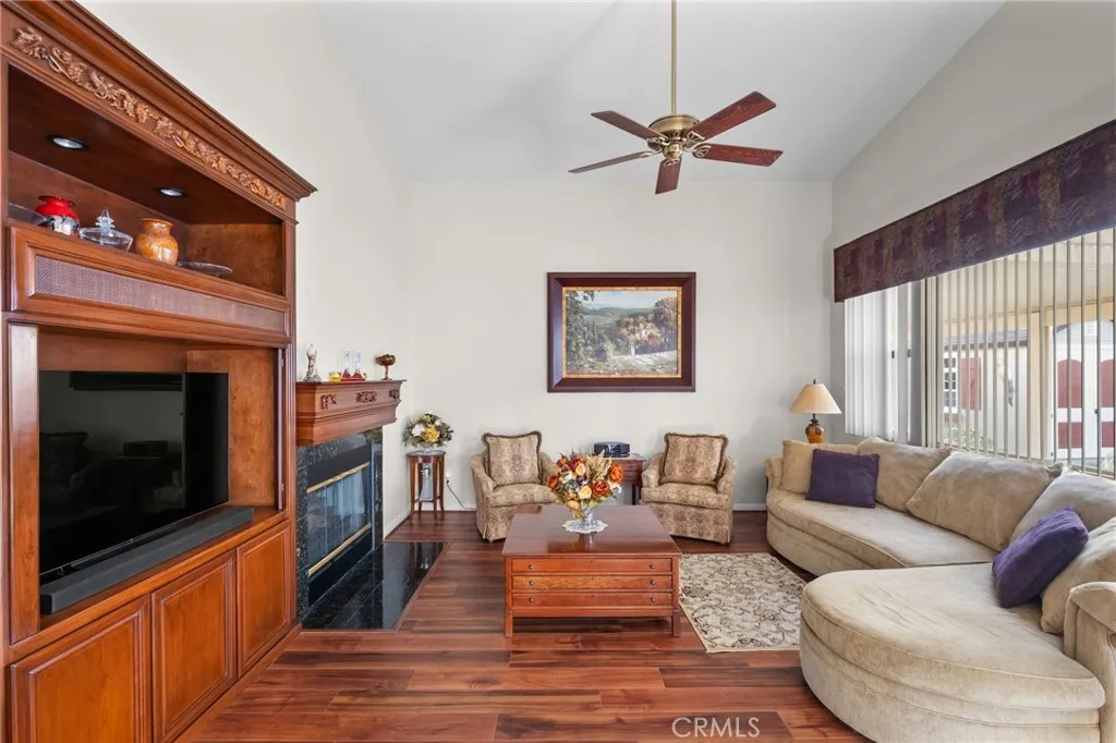 Family Room Directly off of the Kitchen Beautiful Built in Cabinetry and Custom Fireplace