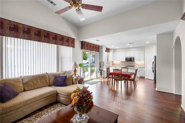 Beautiful Dark Wood Laminate Flooring Throughout the Entire Home