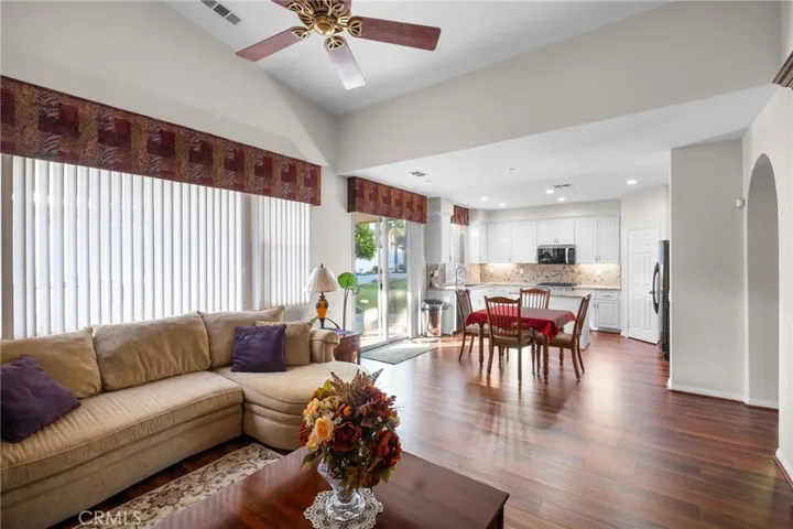 Beautiful Dark Wood Laminate Flooring Throughout the Entire Home