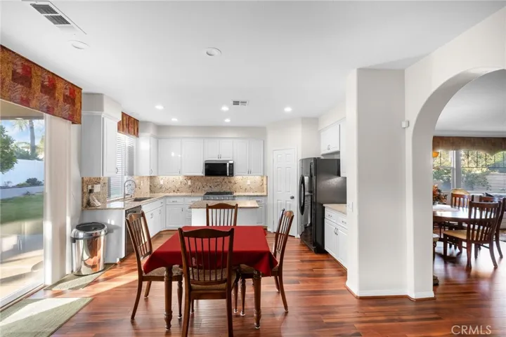 Light and Bright Newly Renovated Kitchen with New Granite Counters, Cabinets, hardware and a Brand new 6 Burner Range