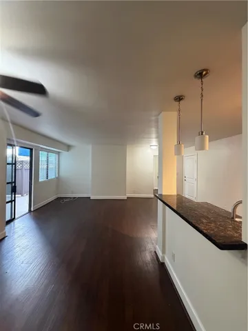 Living room that connects to a spacious patio