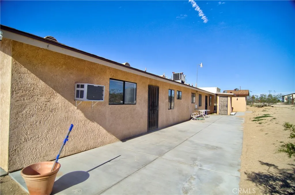 The entire 5 acres is fenced, and this backyard area is fenced in addition, great for dogs.