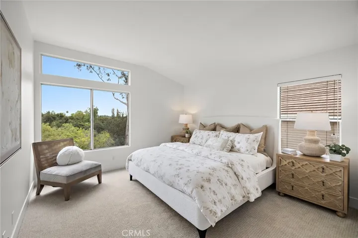 Spacious Vaulted Primary Bedroom with view of Whiting Ranch