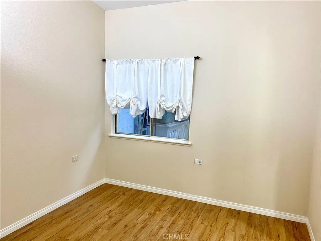 2nd bedroom with window to patio area