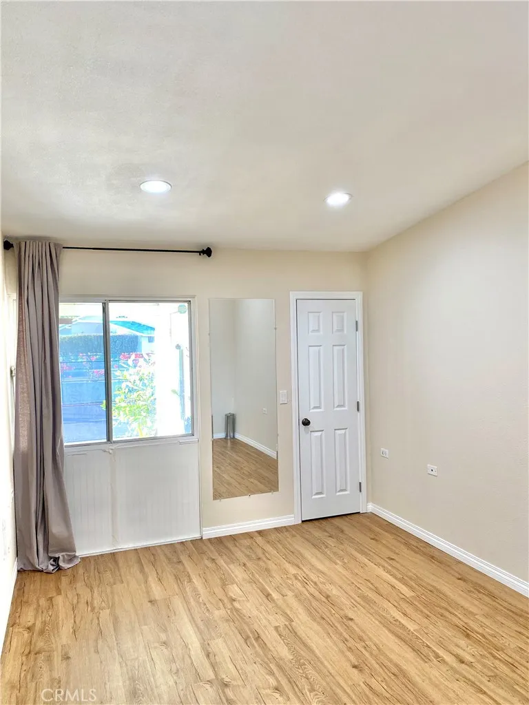 main bedroom with window to front porch