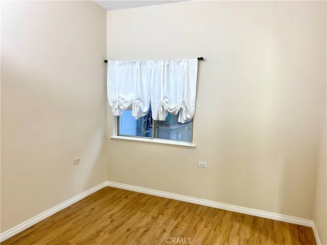 2nd bedroom with window to patio area