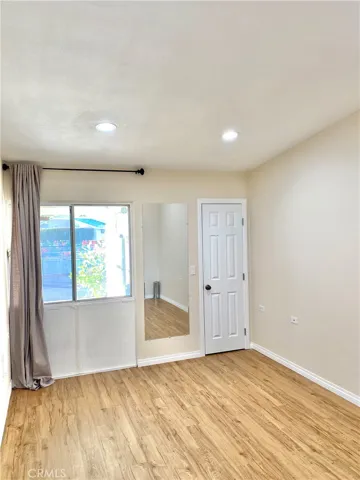 main bedroom with window to front porch