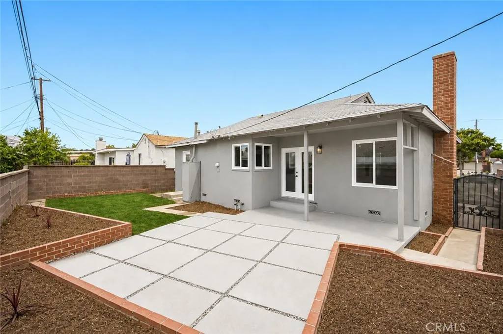 Photo digitally altered to show new gray color of home