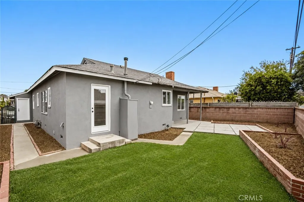 Photo digitally altered to show new gray color of home