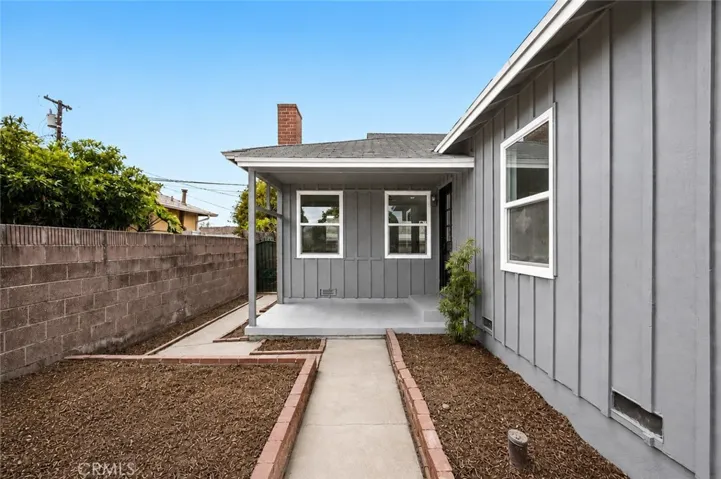 Photo digitally altered to show new gray color of home