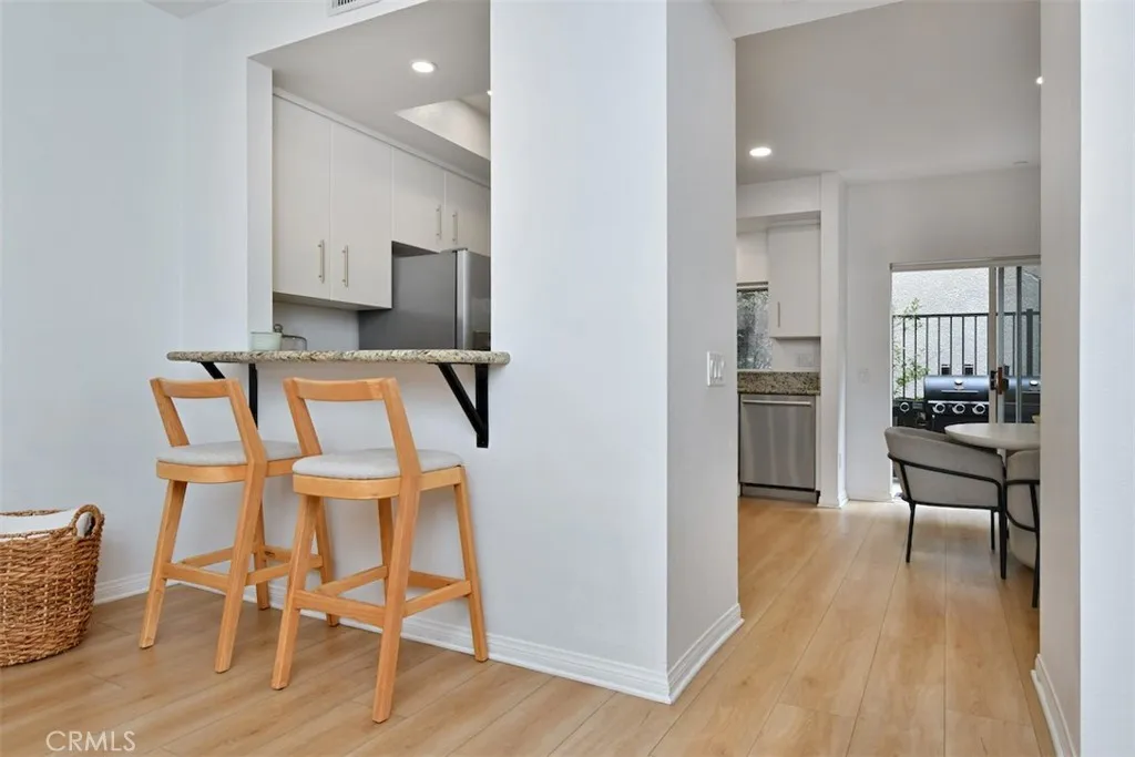 Breakfast Bar and View of Kitchen/Dining Area