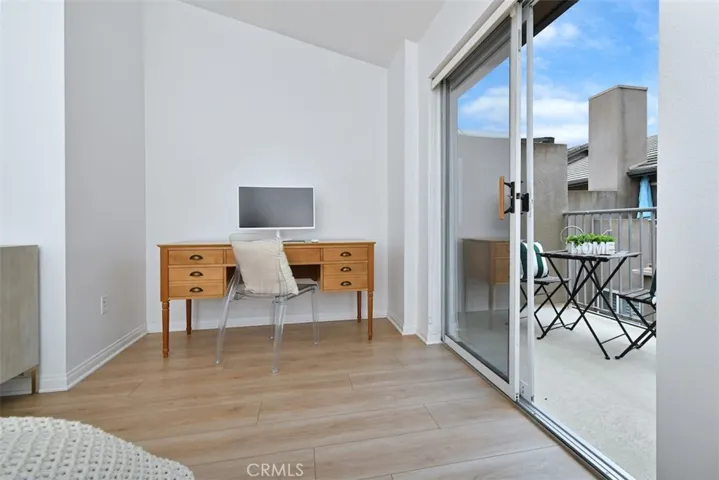 Primary Bedroom with Balcony