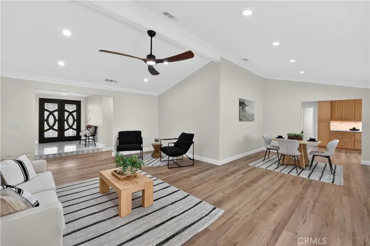 Open concept living to dining area