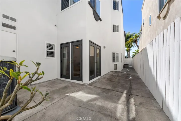 Private side yard off the den and family room, perfect for outdoor dining and relaxing