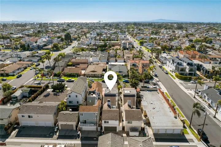 Aerial perspective of the home facing southwest with close proximity to the ocean