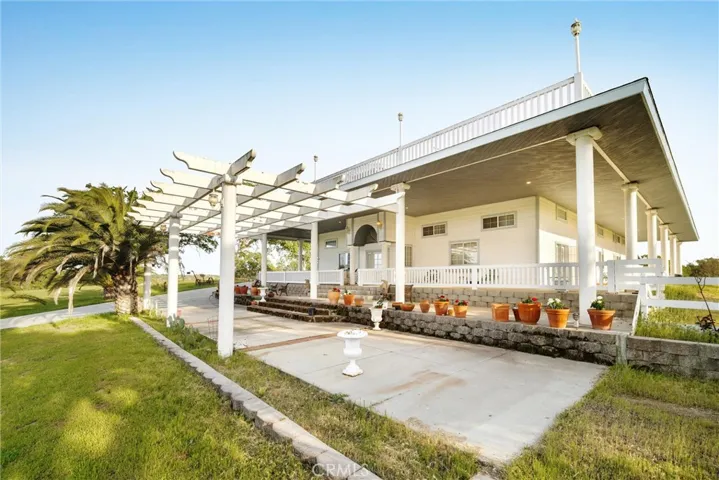 Wrap-around decks and additional parking area at main residence