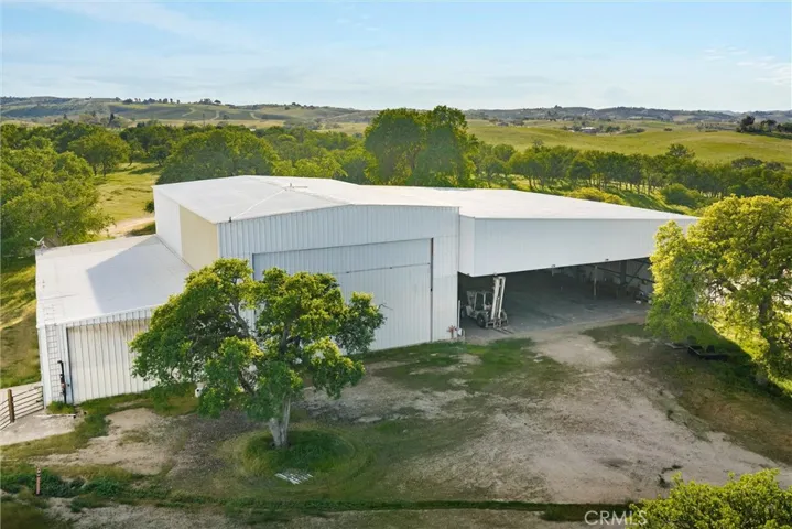 Aerial view of larger warehouse building